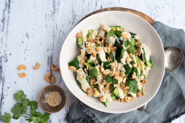 Smashed cucumber salad with creamy ginger-miso peanut dressing